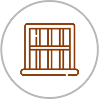Brown jail cell icon on black background.